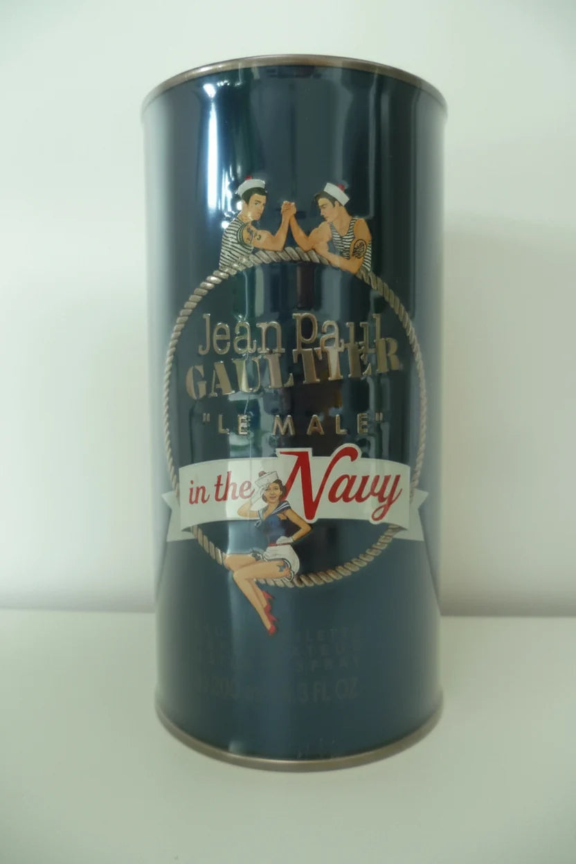 Cylindrical container with 'Jean Paul Gaultier Le Male in the Navy' branding on a white background